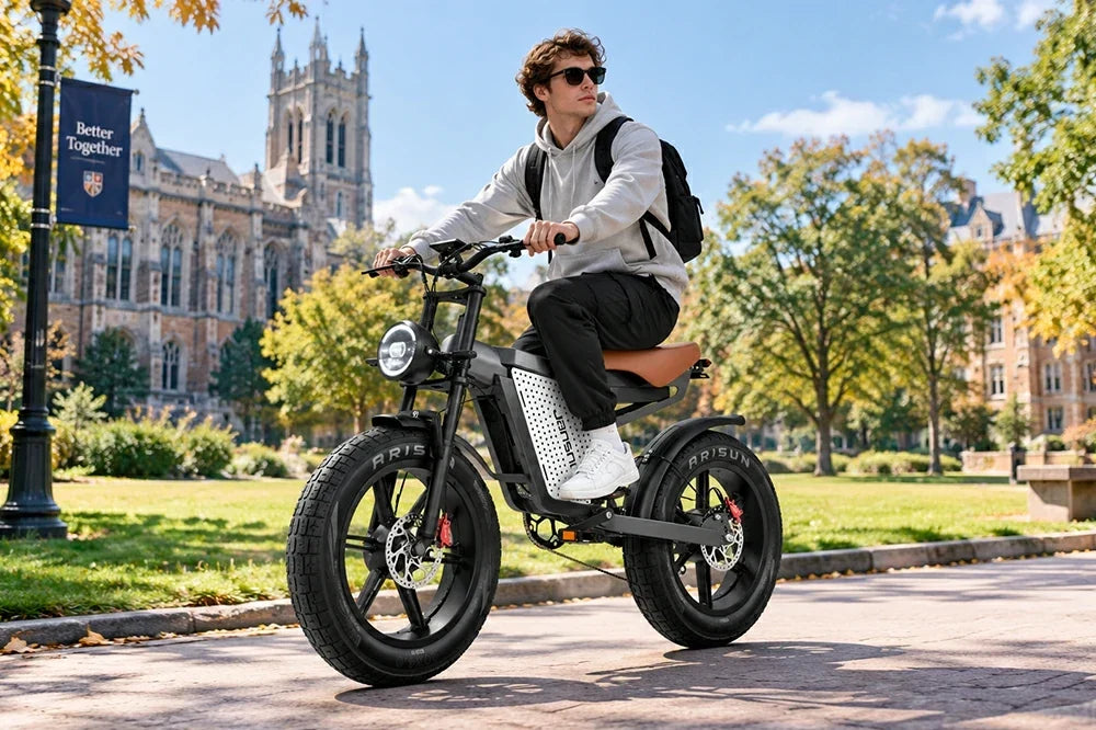 Man riding Jansno X60 fat tire electric bike on autumn university campus
