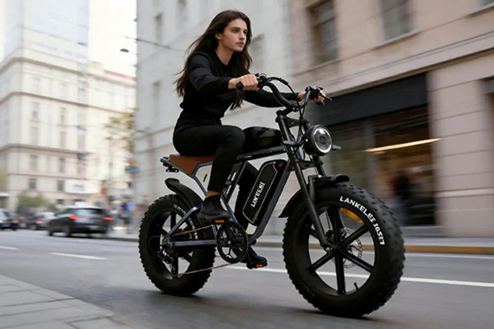 Jansno X70 vintage-style fat-tire e-bike being ridden by a woman through a busy city street.